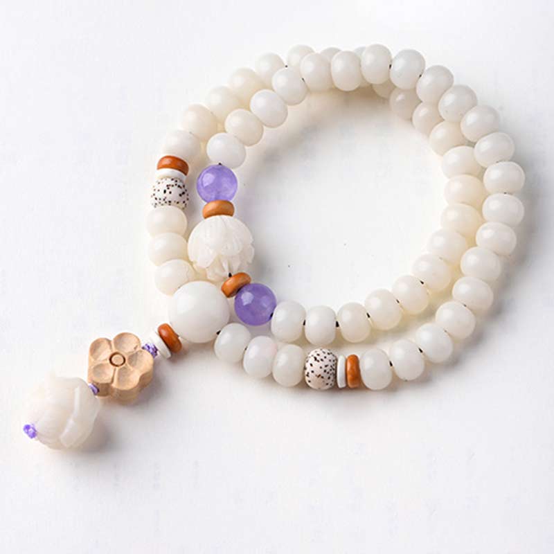Armband Weiße Jade Bodhi Lotus mit lila Amethyst und Holzperlen elegant.