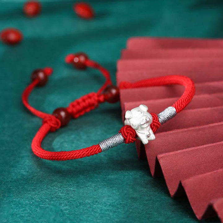 Rotes Armband 925 Silber Chinesisches Tierkreis Glück Stärke Schmuck Flatlays