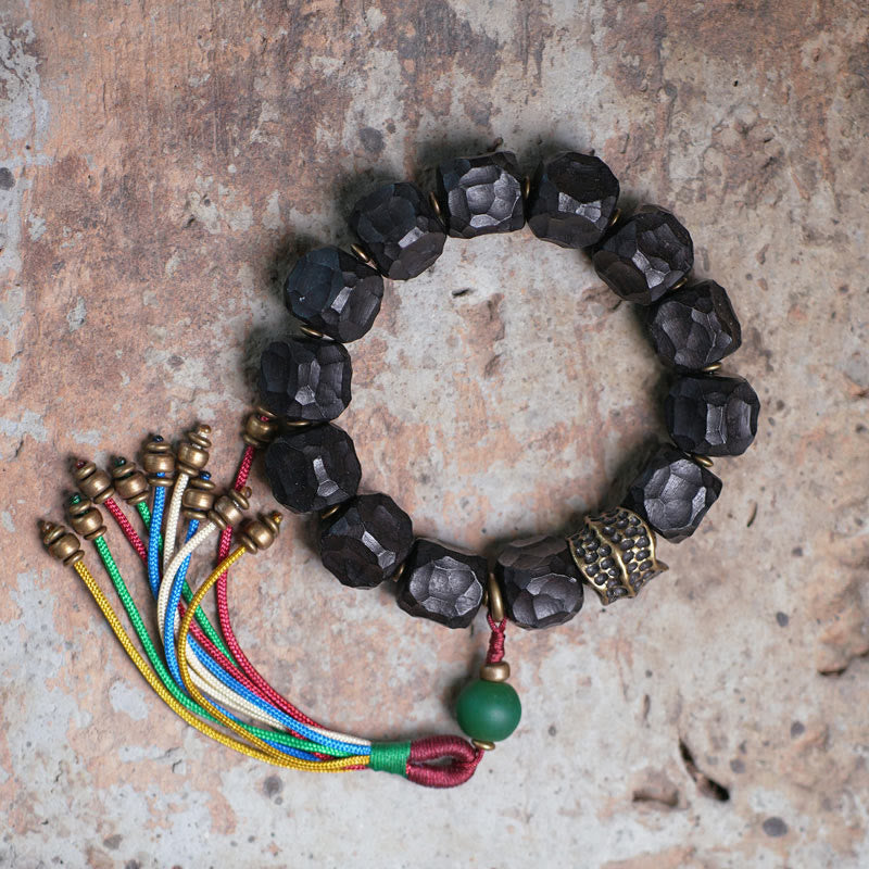 Mala Kupfer Ebenholz Frieden Armband schwarze Perlen bunte Quasten.