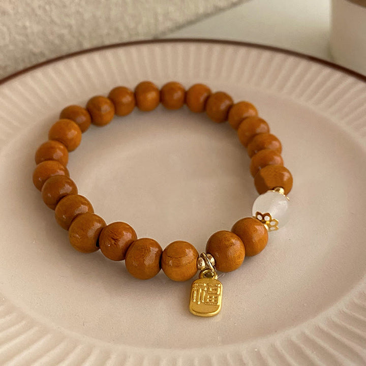Armband Sandelholz Fu-Zeichen Schutz braune Perlen Weiß Gold elastisch