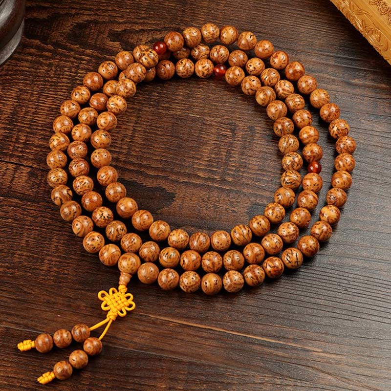 Armband Tibet Bodhi Samen Weisheit Holzperlen Flachlage Holzoptik braun