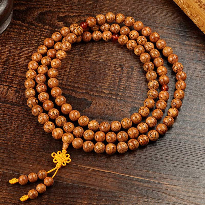 Armband Tibet Bodhi Samen Weisheit Holzperlen Flachlage Holzoptik braun