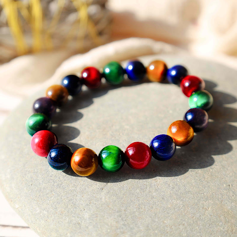 Buntes Armband Tigerauge – Mut mit glänzenden Naturstein Perlen elastisch.