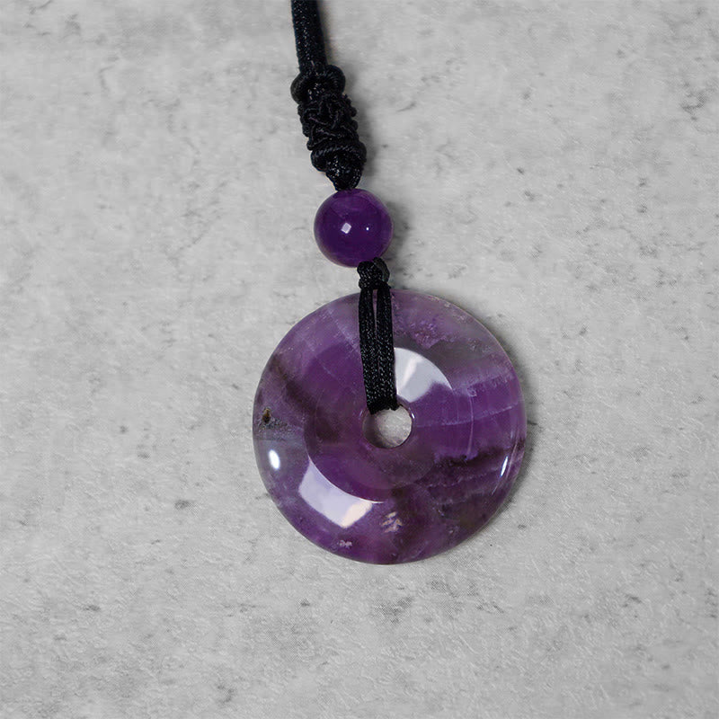 Amethyst Kette mit Donut Anhänger schwarzes Band Naturstein