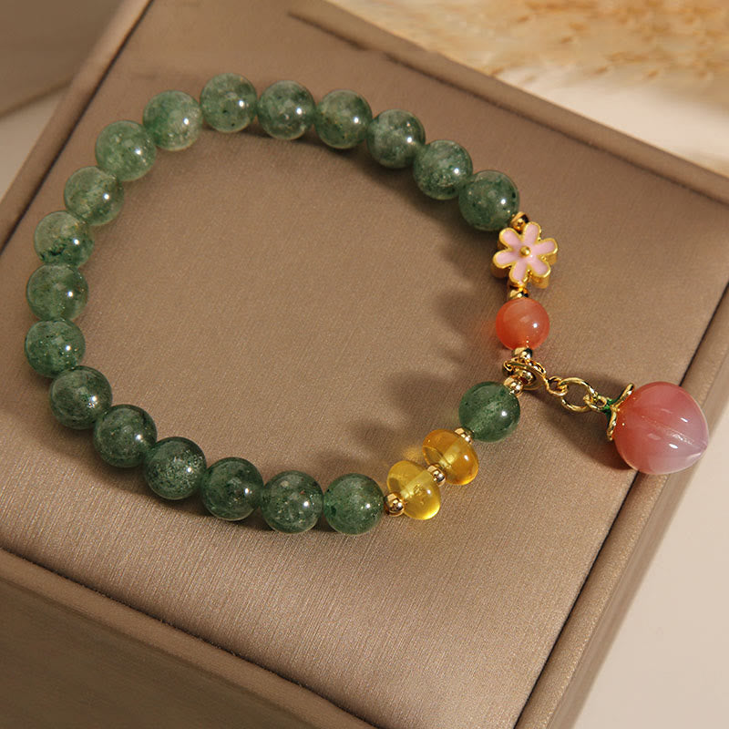 Armband Erdbeerquarz – Liebe mit grünen Steinen und Blütenanhänger