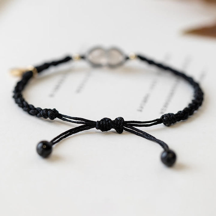 Schwarzes Armband – Frieden mit Knoten und Perlen elastisch