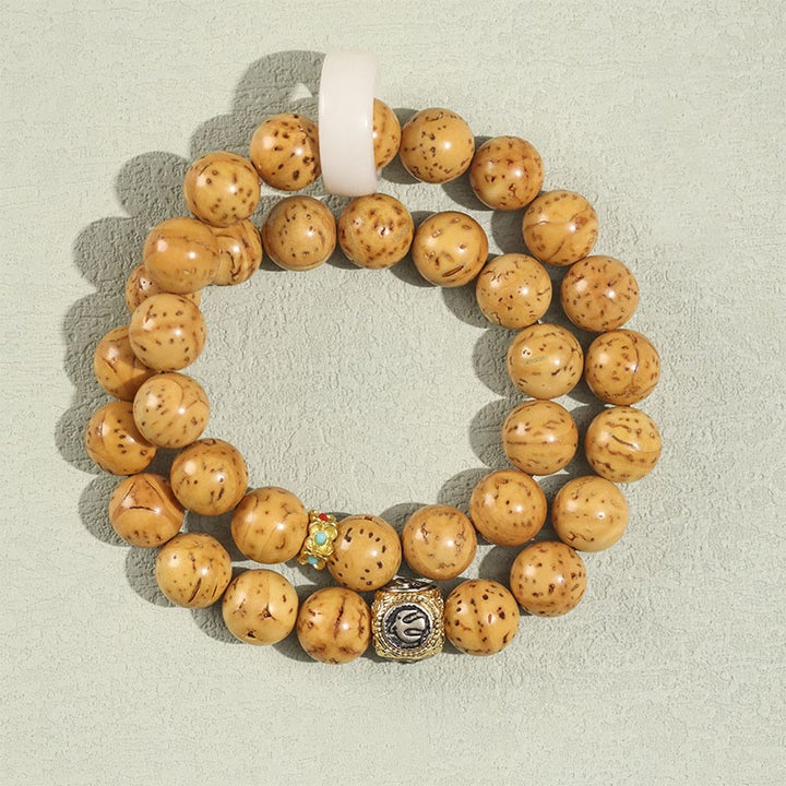 Armband Bodhi – Wohlstand Balance mit natürlichen Holzperlen und Metallakzenten