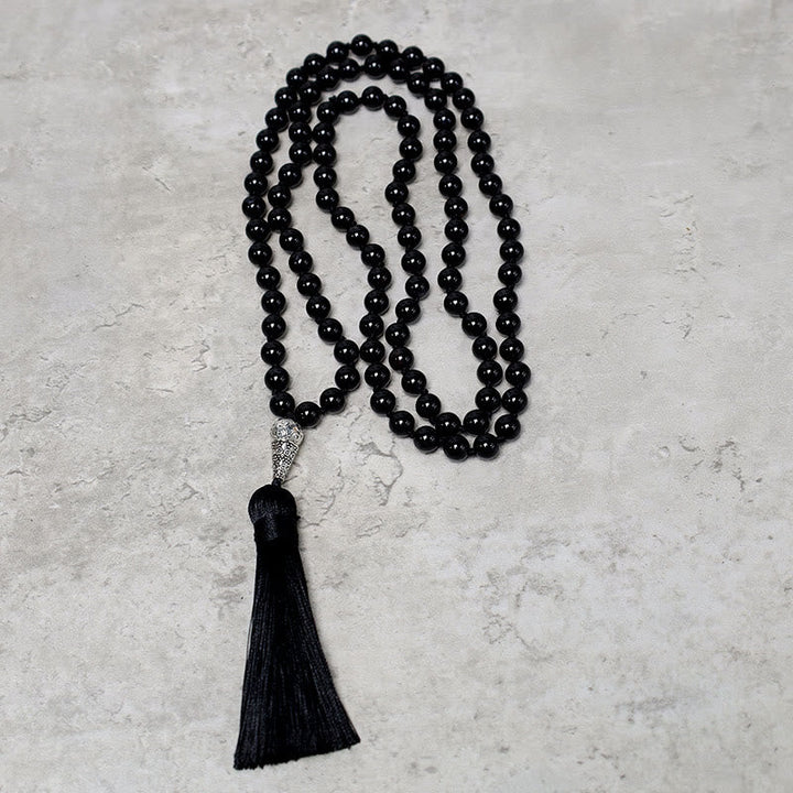Mala 108 Schwarzer Onyx flach arrangiert mit schwarzer Quaste Meditationsperlen