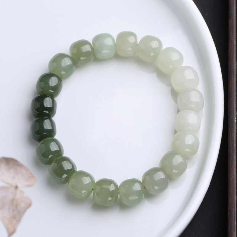 Jade Armband Glück & Segen grüne Perlen Naturstein Flachaufnahme weiß