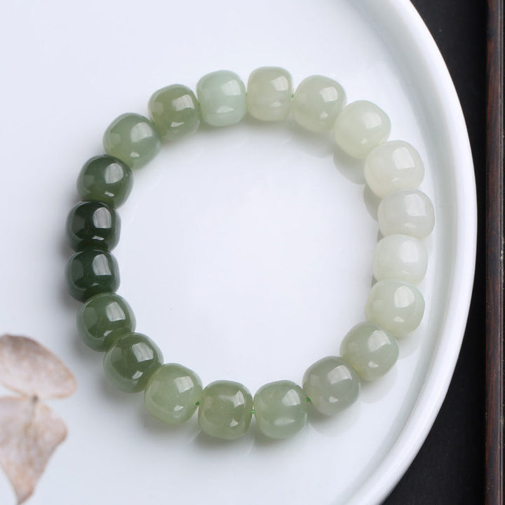 Jade Armband Glück & Segen grüne Perlen Naturstein Flachaufnahme weiß