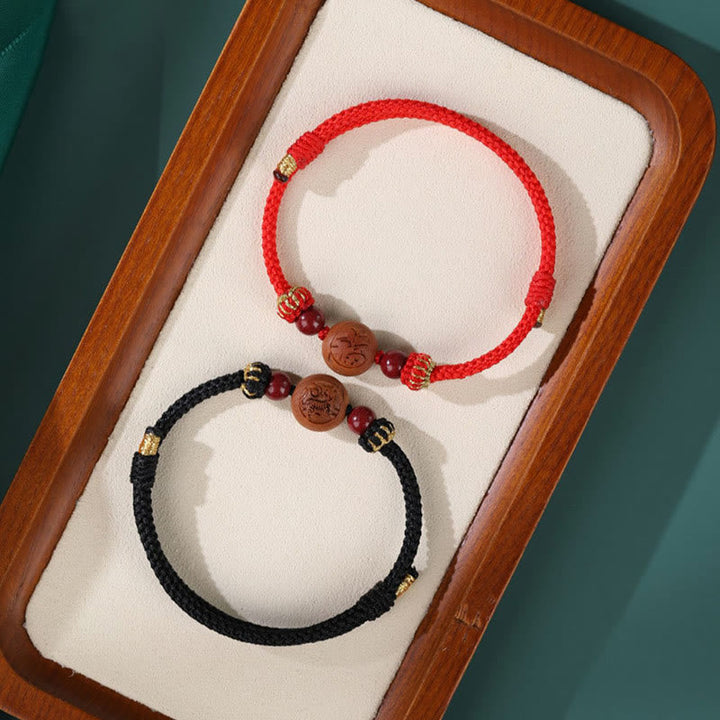 Rotes und schwarzes Armband Zinnober Chinesisches Tierkreis – Wohlstand mit Perlen.