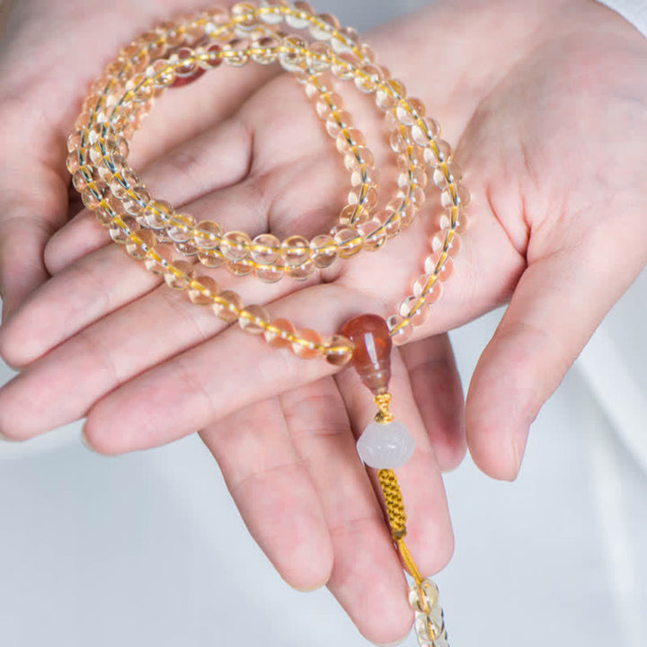 Citrin Mala Kette mit rotem Achat und weißer Jade Anhänger.