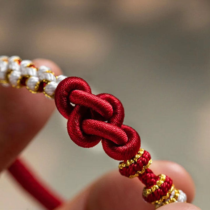 Rotes Seidenarmband Pfirsichblüte mit goldfarbenen Perlen Glück Liebe
