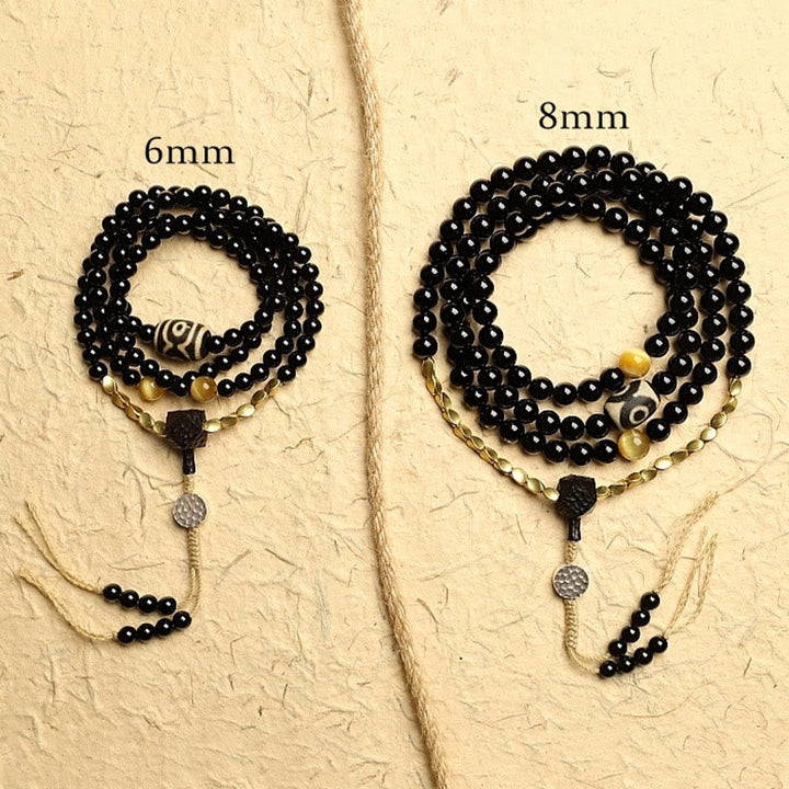 Mala Schwarzer Onyx – Schutz Perlenarmband in zwei Größen verglichen.