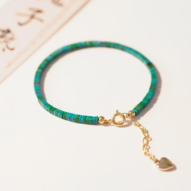 Armband Türkis Gold Herz Charm elegantes Accessoire Naturstein