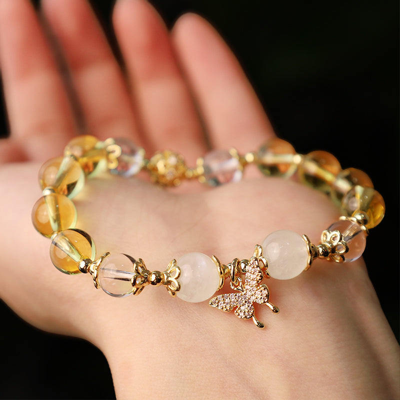 Armband Mondstein Citrin Schmetterling am Handgelenk mit Schutz Wohlstand