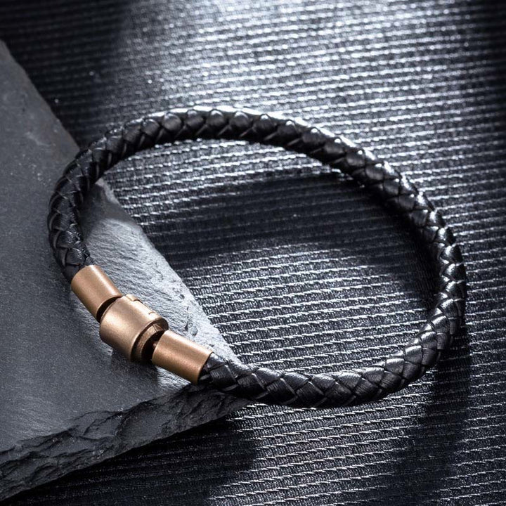 Geflochtenes schwarzes Lederarmband mit bronzefarbenem Magnetverschluss Vintage