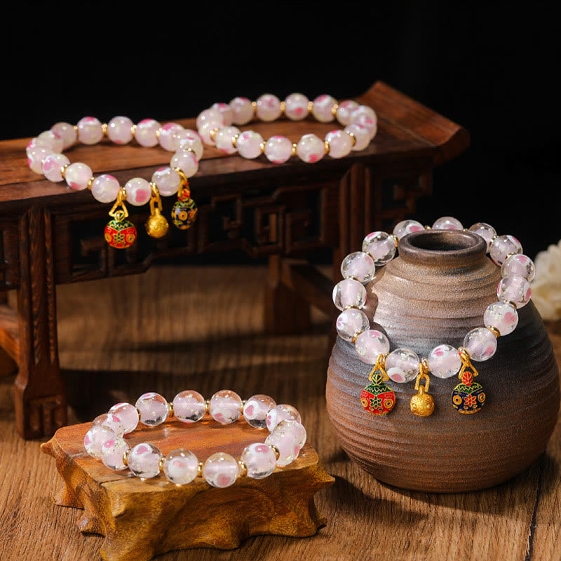 Rosenquarz Armband – Liebe & Segen mit goldfarbenen Perlen Anhängern.