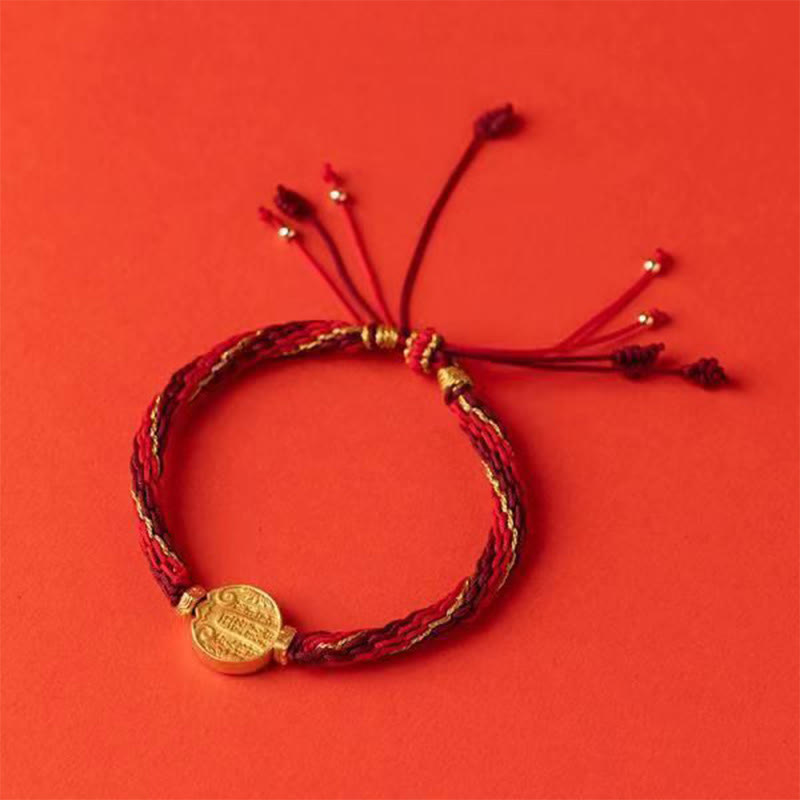 Rotes Seidenarmband mit goldener Münze Schutz und Wohlstand