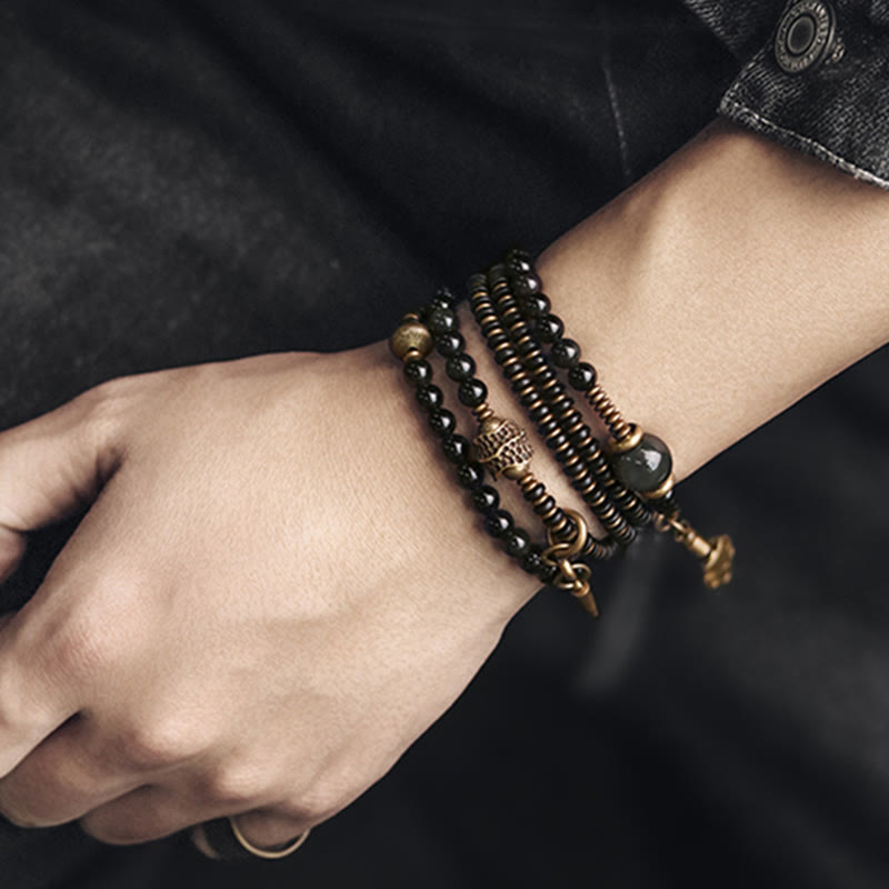 Armband Obsidian Kupfer mehrsträngig am Handgelenk getragen elegant