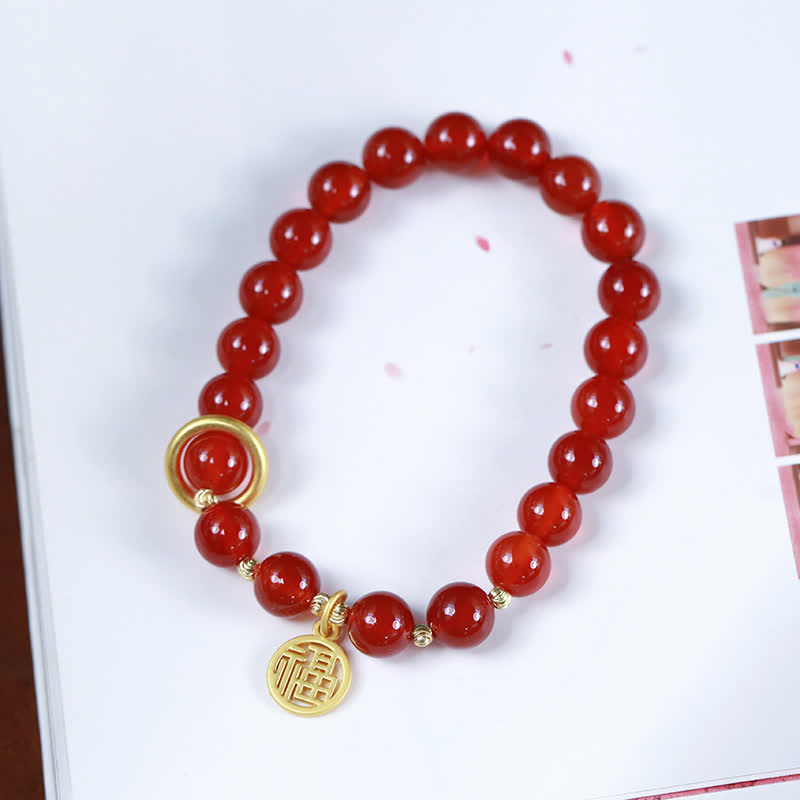 Armband Roter Achat mit goldenem Segen Anhänger elastisch