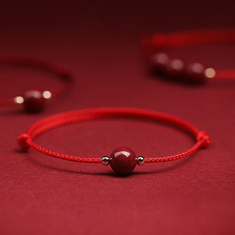 Rotes Armband Zinnober – Glück & Segen mit Naturstein Flachaufnahme