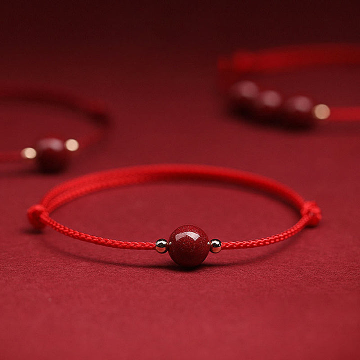 Rotes Armband Zinnober – Glück & Segen mit Naturstein Flachaufnahme