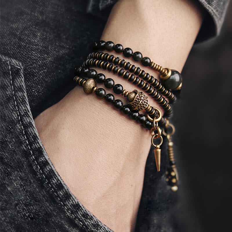 Armband Obsidian Kupfer mehrsträngig am Handgelenk getragen elegant