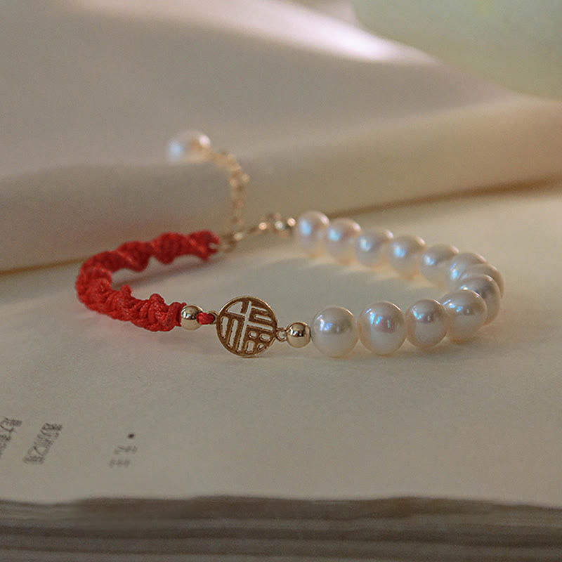 Armband Perle – Schutz & Glück mit roten Fäden und Goldakzenten