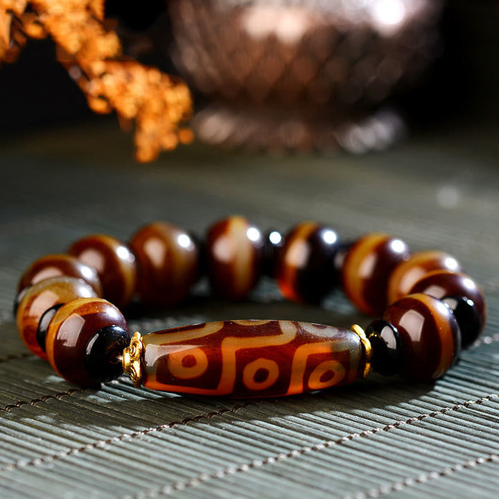 Armband Achat – Wohlstand & Segen braune Natursteinperlen elastisch getragen