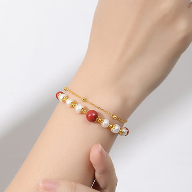 Armband 925 Silber Zinnober mit roten weißen Perlen elegant am Handgelenk