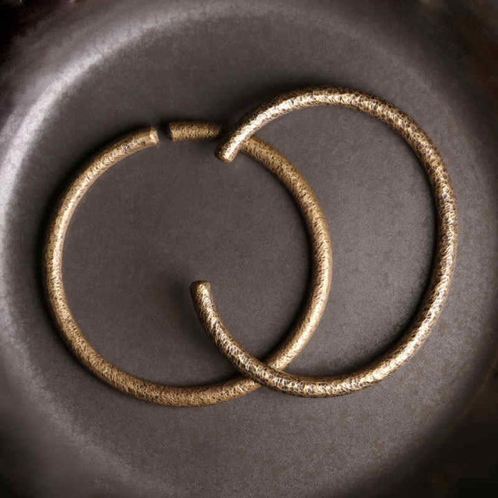 Armband Kupfer – Balance Harmonie golden glänzend Creolen elegantes Design.