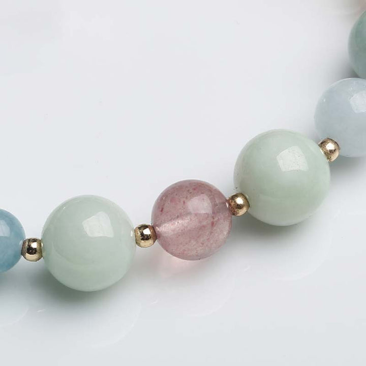 Jade Armband mit grünen und rosa Steinen, goldene Perlen, Glück Balance.