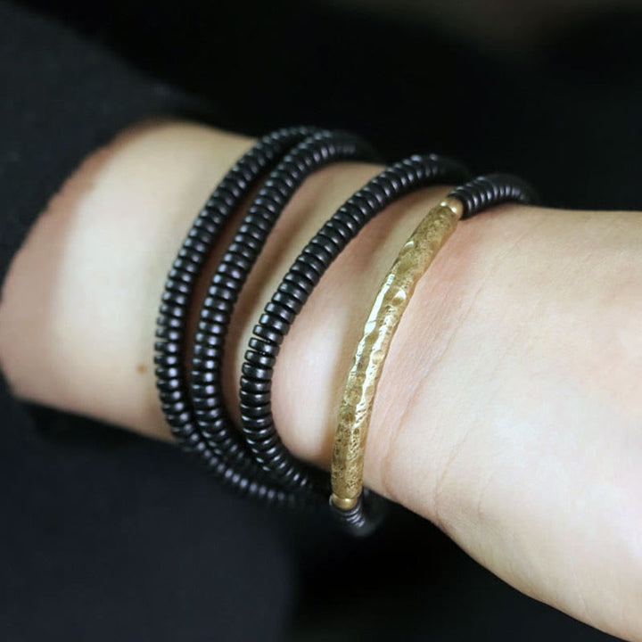 Armband Kupfer Ebenholz – Balance mehrere schwarze Perlenarmbänder goldenes Armband