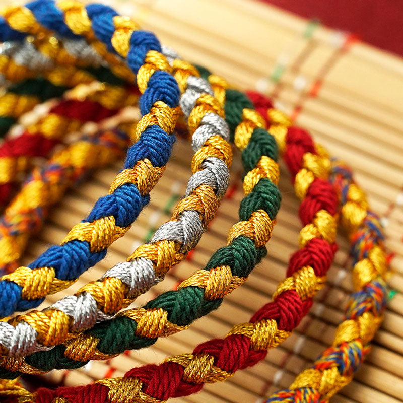 Armband Drachen mit bunten geflochtenen Schnüren Glück Wohlstand Energie.
