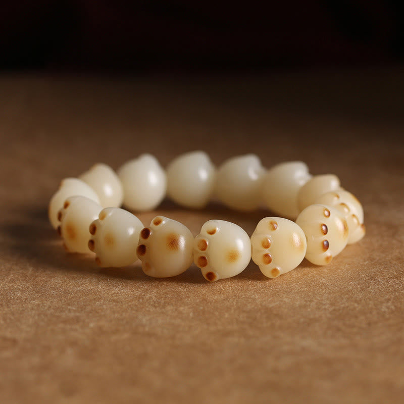 Bodhi Katze Armband mit cremefarbenen Perlen und braunen Markierungen elastisch