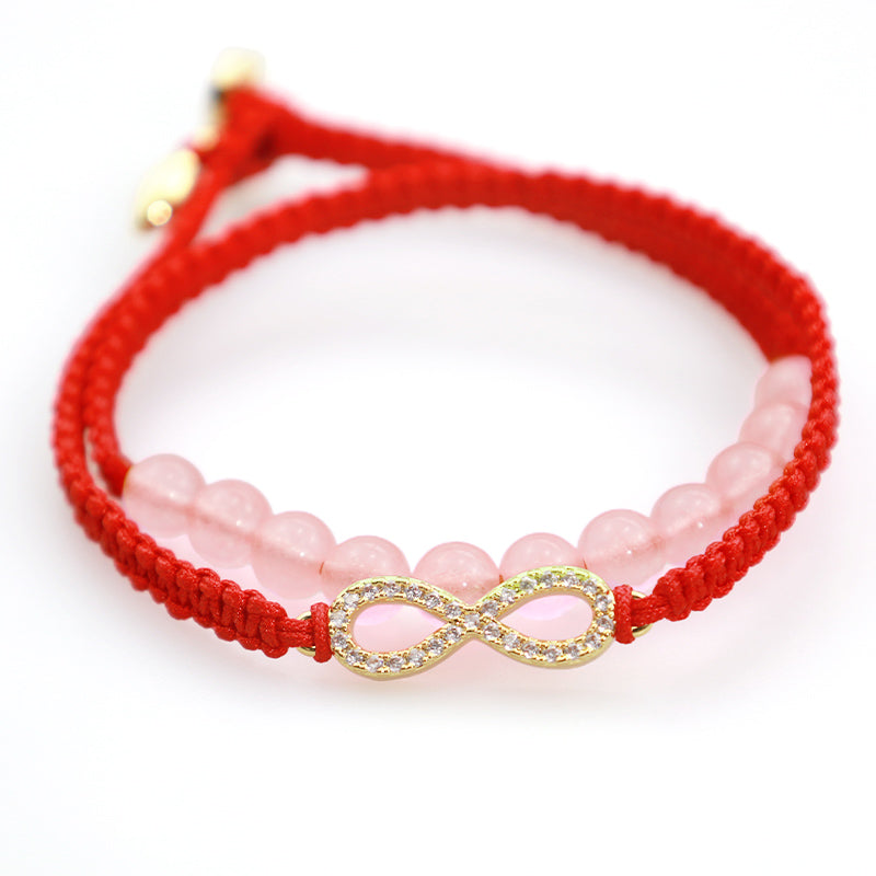 Rotes Armband Kristall Lotus mit rosa Quarzperlen und Infinity-Charm.