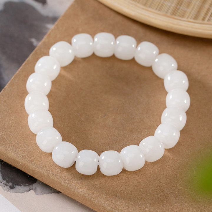 Armband Weiße Jade – Glück & Segen eleganter Naturstein elastisch getragen