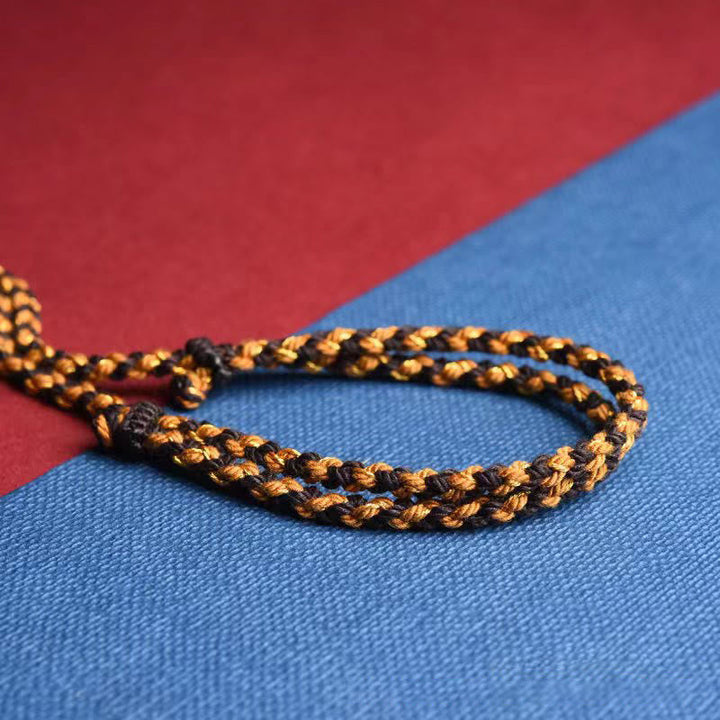 Tibetischer Knoten Armband geflochten braun gold handgefertigt
