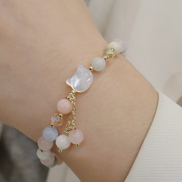 Armband Erdbeerquarz Katze – Liebe zartes Rosa Naturstein elegant getragen