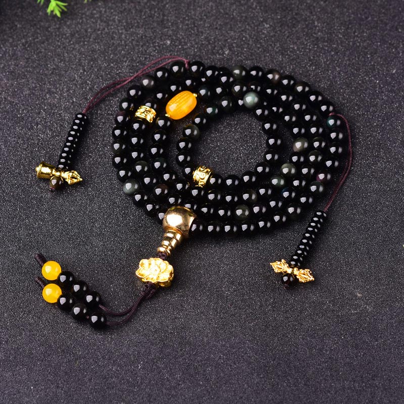 Armband Schwarzer Obsidian mit goldenen Perlen und gelben Steinen elastisch.