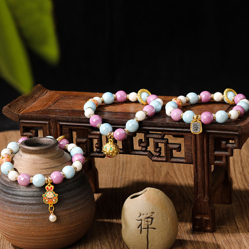 Armband – Schutz & Wohlstand & Energie mit Rosenquarz und Perlen elegant.