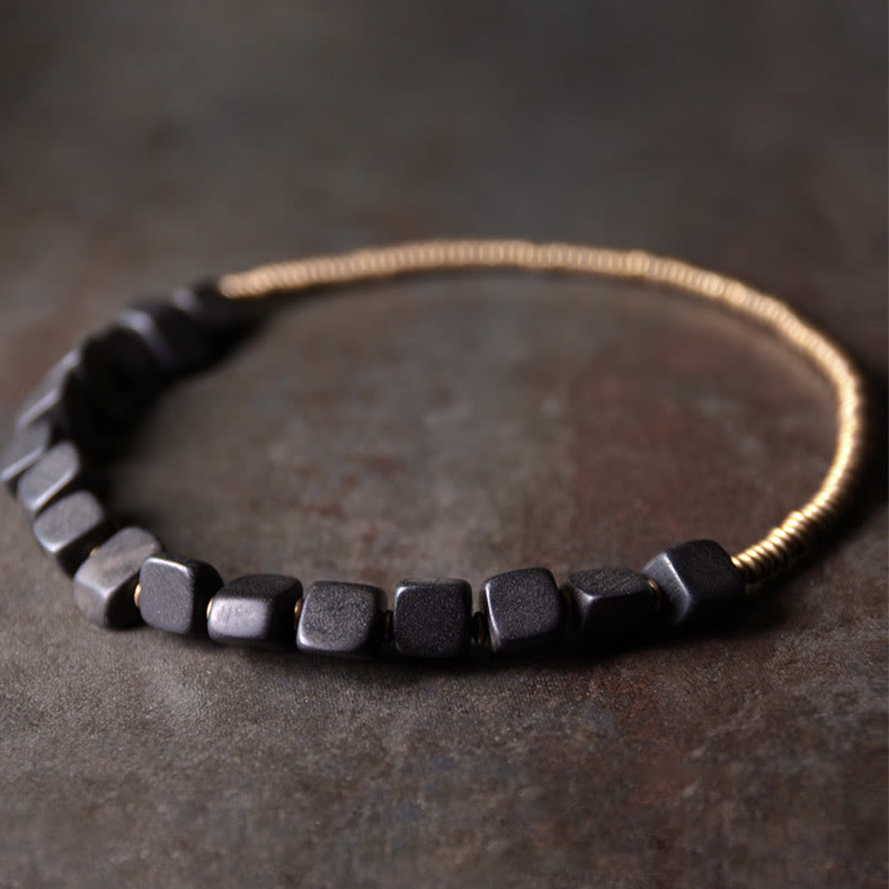 Armband Kupfer Ebenholz mit schwarzen Würfelperlen elegant gestylt