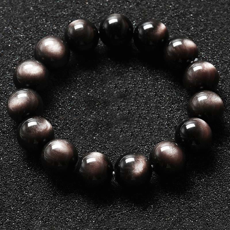 Obsidian Armband Silber schwarze Perlen Schutz Flachaufnahme dunkler Hintergrund