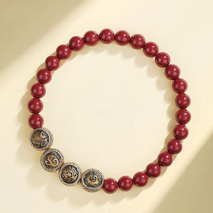 Rotes Zinnober Armband 925 Silber elegant mit Natursteinen getragen