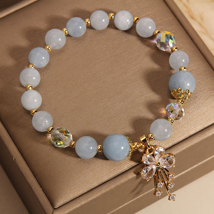 Armband Aquamarin Kristall Schmetterling elastisch gold hellblau Perlen Heilung