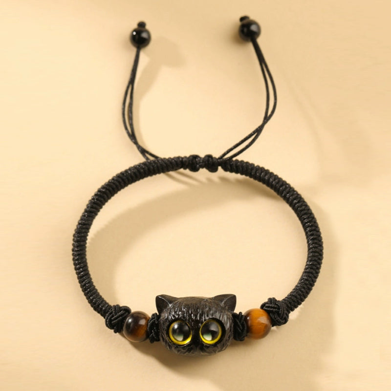 Armband Ebenholz Katze mit gelben Augen und Tigerauge Perlen elastisch.