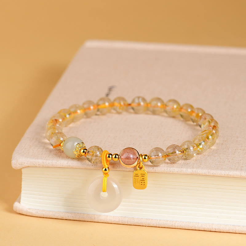 Armband Fu-Zeichen Wohlstand Frieden Citrin Perlen goldene Akzente elegant.
