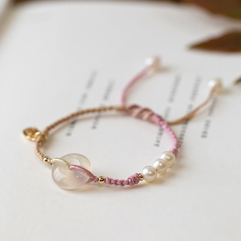 Armband – Frieden mit Rosenquarz Perlen und Rosa Schnur elegant