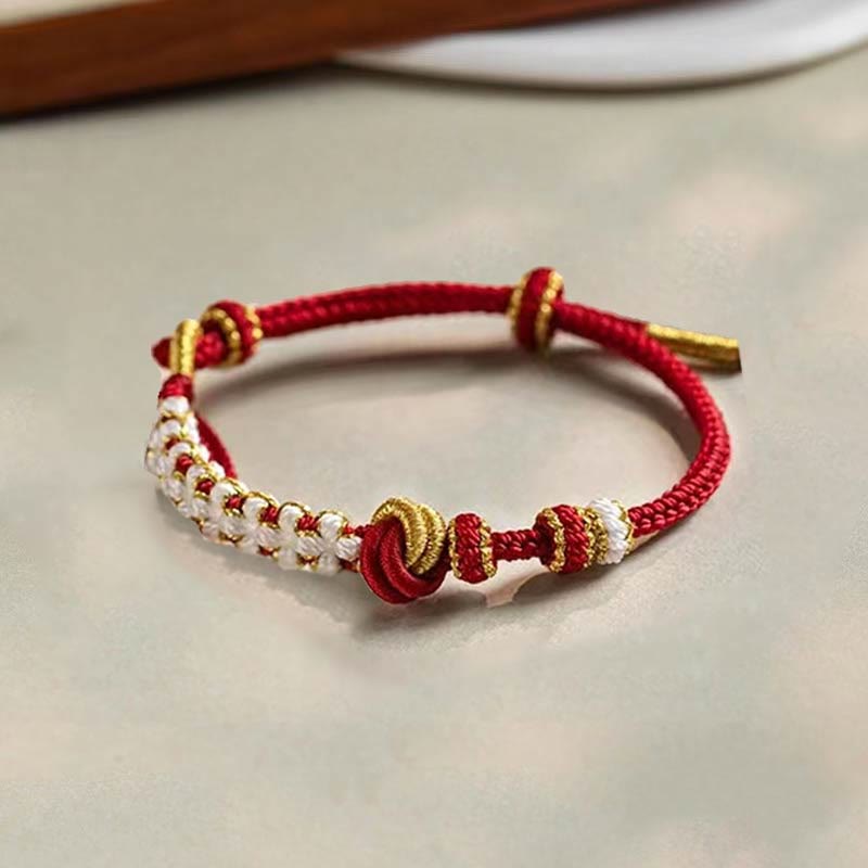 Armband Pfirsichblüte rotes Seidengeflecht goldene Perlen Glück Liebe elastisch